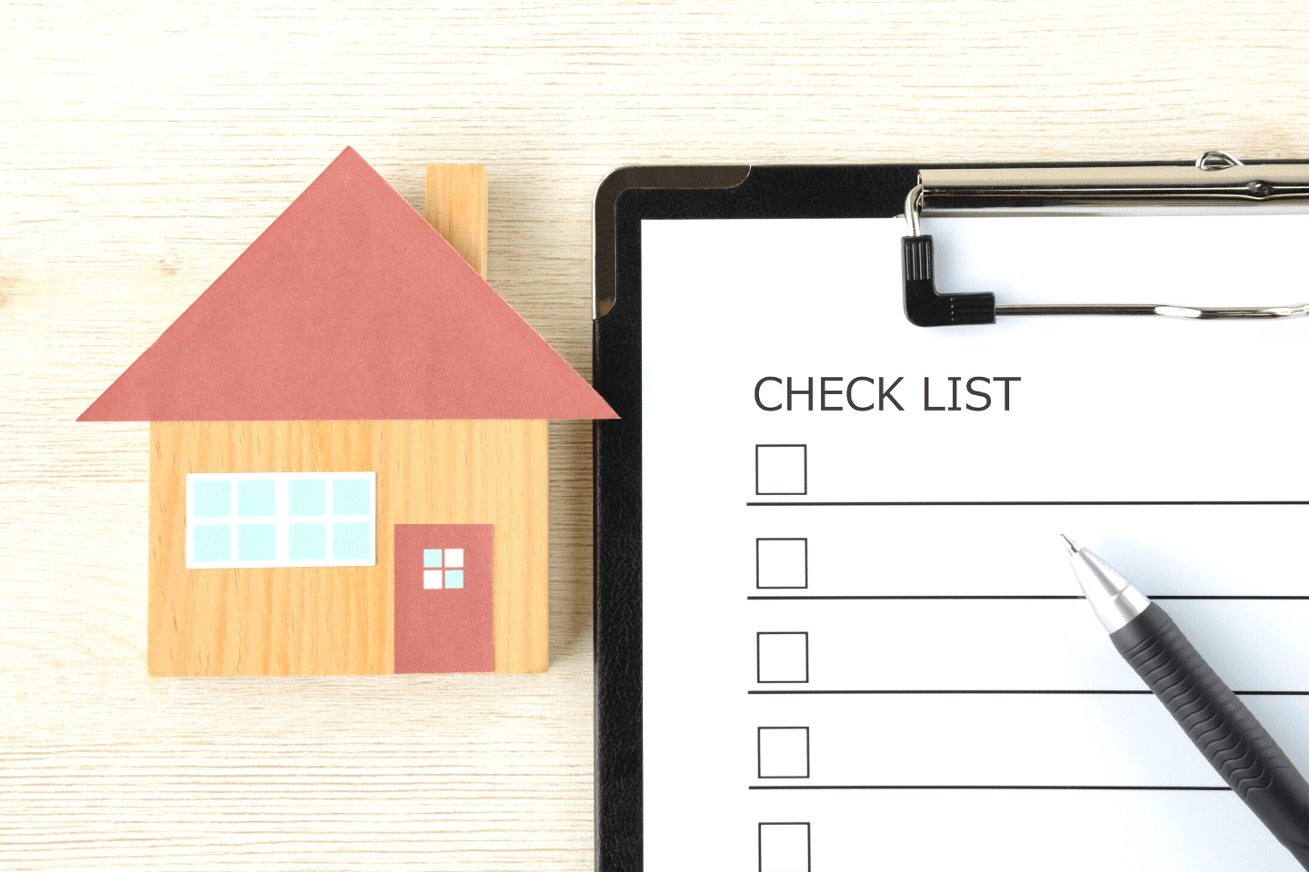 reviewing a house hunting checklist together at home