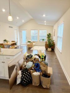 Decluttering critical areas of the home including bedrooms, kitchen, bookshelves, desks, laundry spaces, bathroom, pantry, and wardrobe