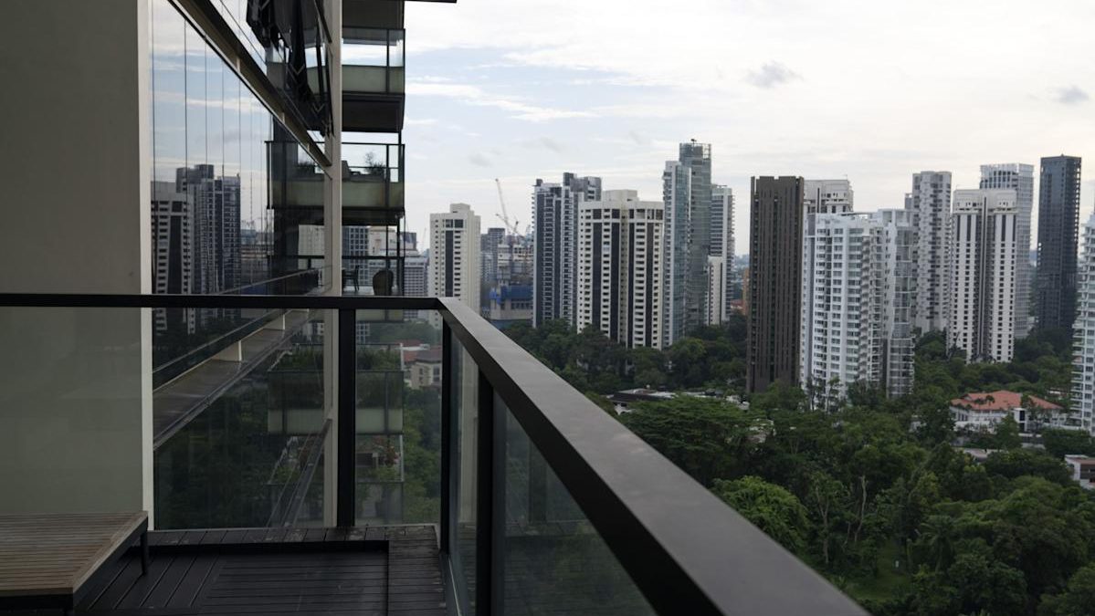 Singapore skyline with property market graph showing 2026 price forecast trends