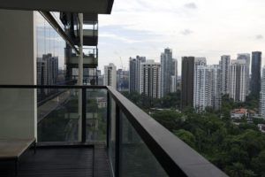 Singapore skyline with property market graph showing 2026 price forecast trends