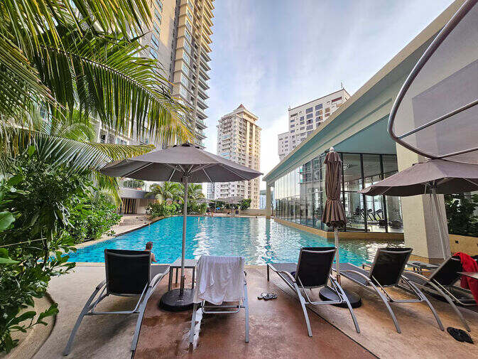 Condominium Pool in Mont Kiara Kuala Lumpur Condominium swimming pool and sun loungers in Mont Kiara, Kuala Lumpur
