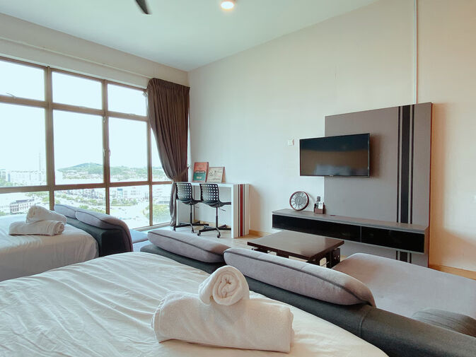 Mount Austin Serviced Apartment Interior Furnished serviced apartment with large windows, representing property options in Mount Austin, Johor Bahru
